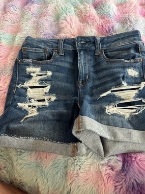 American Eagle Outfitters Ripped Rolled-Hem Denim Shorts in Blue